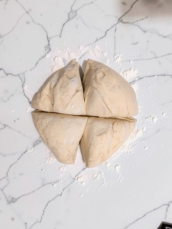 easy pizza dough divided into portions