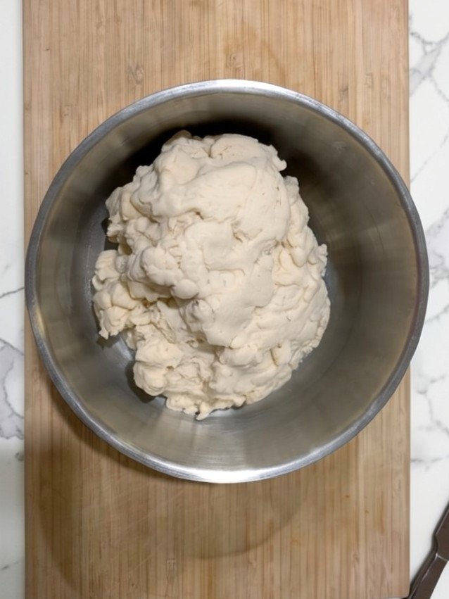 easy pizza dough recipe in a bowl